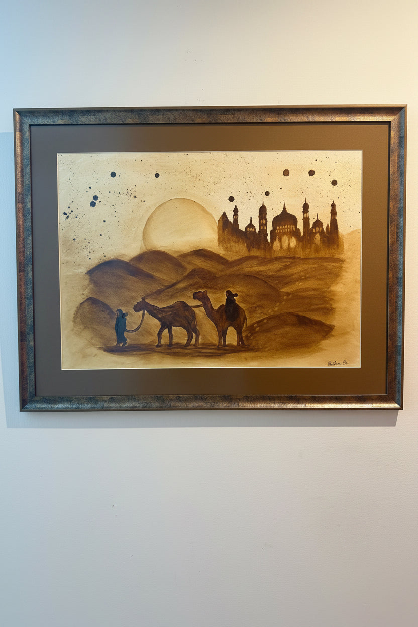 Original coffee painting on paper by Cristina Gabriela depicting a lone traveler leading two camels through golden desert dunes toward a distant illuminated city beneath a large setting sun. Warm sepia tones create a peaceful and timeless atmosphere.