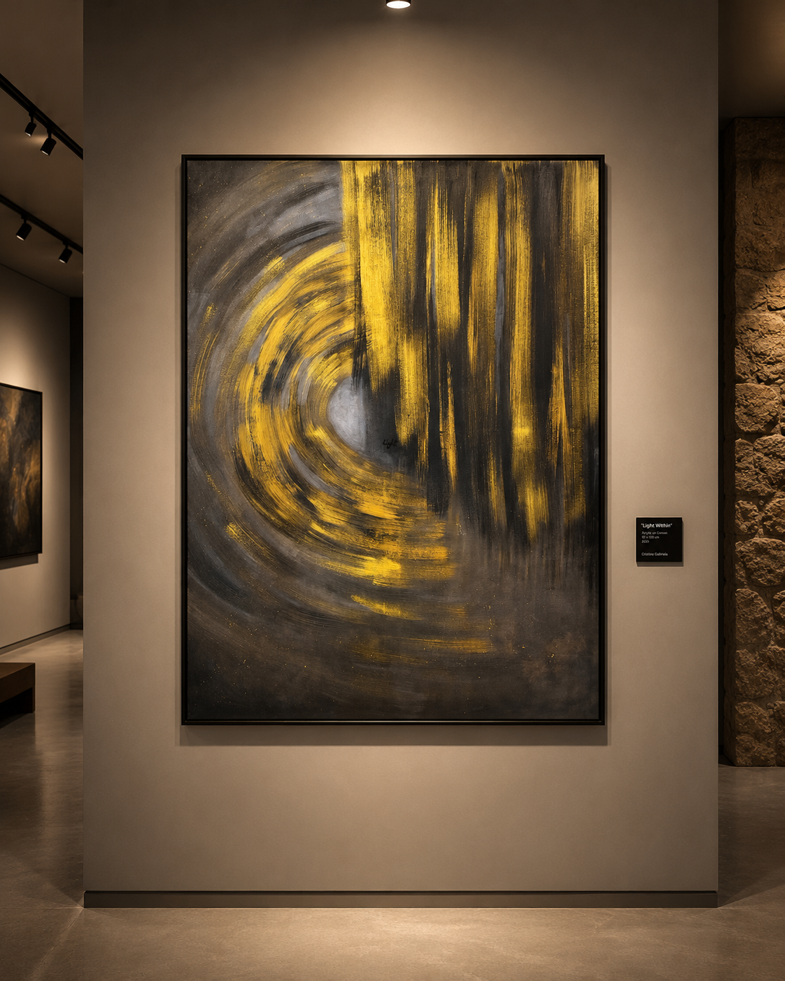 A large framed abstract painting hangs on a gallery wall. The artwork features a swirling, tunnel-like composition with bold yellow brushstrokes over dark gray and black tones.